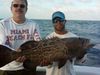 Bobby_with_a_big_grouper_caught_aboard_the_Big_Game.jpg