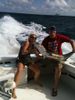 Capt_Ashley_and_Brett_with_a_big_cobia.jpg