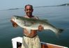 emilio_with_striped_bass_june_10_2008.jpg