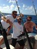 Capt_Dave_and_Austin_with_a_nice_wahoo_caught_with_New_Lattitude_Sportfishing.jpg