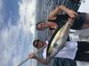 Capt_Rod_and_Ashlee_with_a_nice_tuna_caught_with_Fishing_Headquarters.JPG