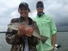 Couple_with_Redfish_Photo_Greg_Stamper.JPG