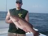 David_an_his_12lb_Mangrove_Snapper.JPG