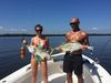 Double_on_Giant_Jack_Crevalle_in_ultra_shallow_water.jpg