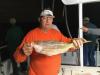 Gene_with_a_nice_yellowtail_snapper_caught_night_anchor_fishing_aboard_the_Catch_My_Drift.JPG