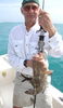 Joel_D_and_his_17in_red_grouper_caught_on_a_GHookup_lure_and_Gulp_shrimp.jpg