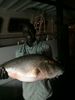 Leslie_with_a_monster_mangrove_snapper_caught_aboard_the_Catch_My_Drift.JPG