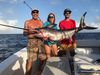 Mick_Kaylee_and_Nick_with_a_nice_swordfish_caught_with_New_Lattitude_Sportfishing.JPG