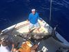 Mick_with_a_monster_swordfish_caught_sportfishing_with_Fishing_Headquarters.JPG