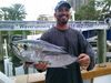 Mick_with_a_nice_blackfin_tuna_caught_sportfishing_aboard_the_New_Lattitude.jpg