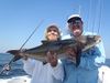 Momma_and_Rick_with_a_cobia-jpeg.jpg
