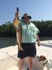 Nice_Redfish_with_Capt_Steve_Sewell_s_masot_looking_on.JPG