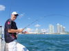 Okan_fighting_his_fish_.jpg
