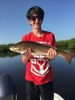 Youngster_with_Redfish_Photo_Capt_Neil_Eisner.JPG