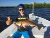Younster_with_Redfish_Photo_Greg_Stamper.JPG