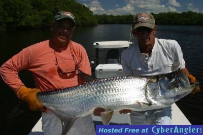 Corbett_Davis_Capt_Bert_Barkus_with_a_nice_river_Tarpon_caught_on_fly1