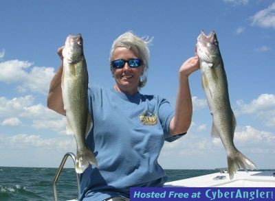 Heidi is a pleased with her Lake Erie walleye charter fishing adventure
