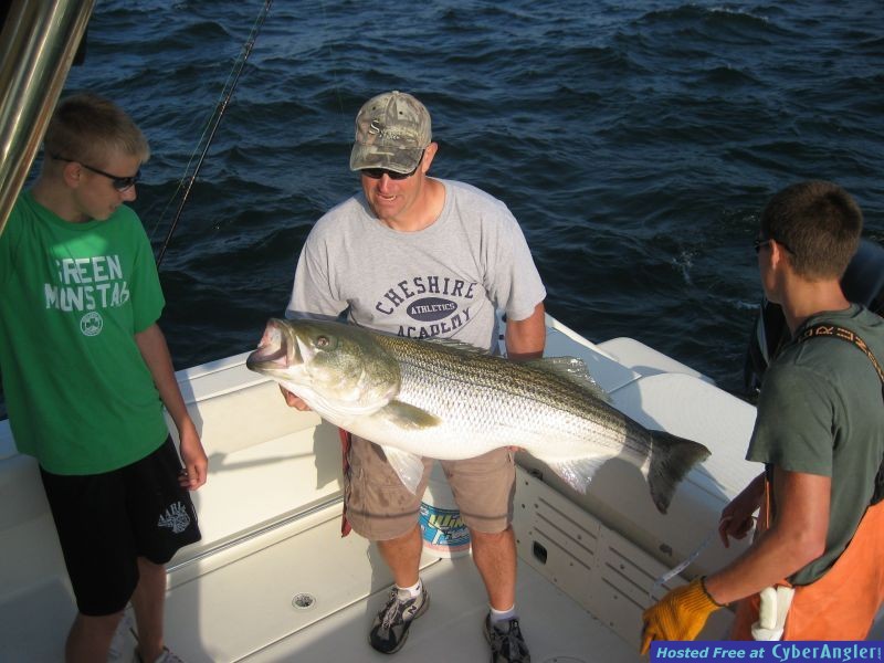 Brett Torrey with his 55 pound Striper