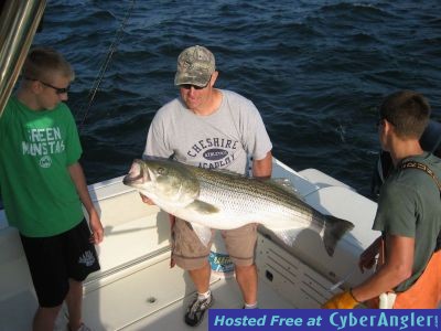 Brett Torrey with his 55 pound Striper