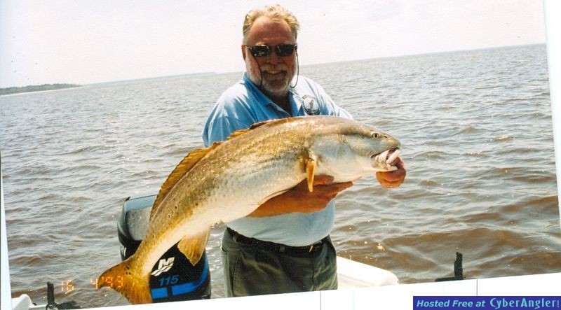 Captain Reynolds and Bull Redfish.
