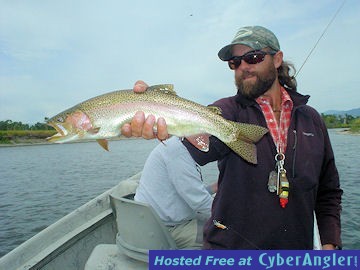 Guide Tyler Barrus with a Jefferson River fly caught rainbow