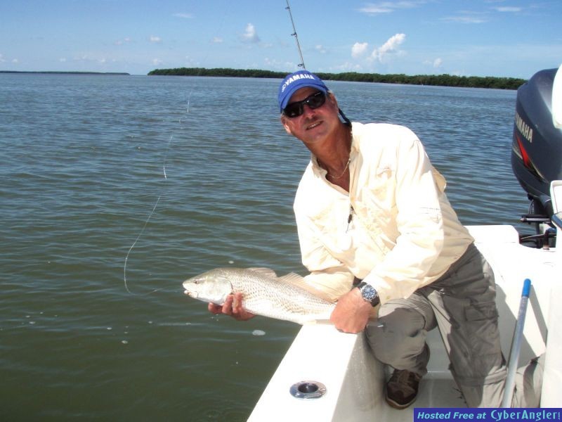 Capt_Alan_and_redfish