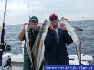 Capt Earl and Mike Founier with some nice cobia