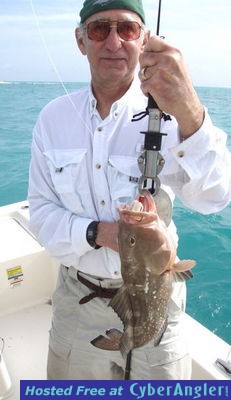 Joel_D_and_his_17in_red_grouper_caught_on_a_GHookup_lure_and_Gulp_shrimp