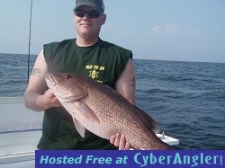 David_an_his_12lb_Mangrove_Snapper