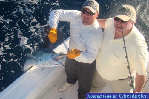 12-4-JJ_and_guy_holding_sail