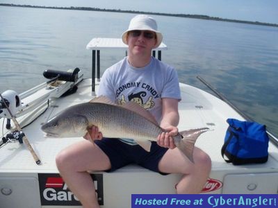 Mark with one of many redfish he caught with Capt. Joe Porcelli
