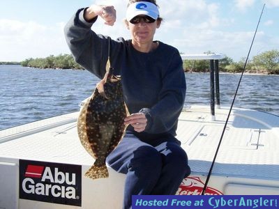 Kim with a nice flounder she caught on a Silver Minnow spoon