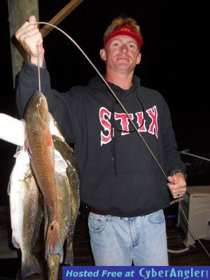 Derek B. with a nice stringer of Specks and Reds