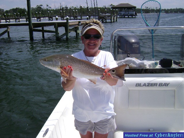 Glenna Roe and her first Red Fish!