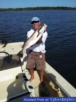 Capt. Joe Porcelli desplays a big trout he caught on Gulp sinking minnow