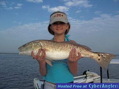 One of Savannah's many reds she caught while fishing with Capt. Joe Porcell