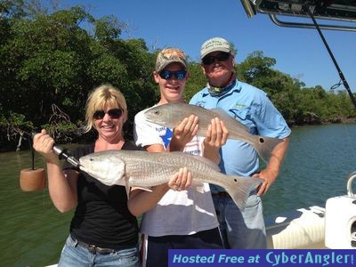 Sea Gone Customers Joanna and Tristan with Redfish