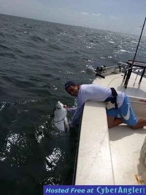 Matthew with a nice size tarpon caught with Captain Troy Mainzer
