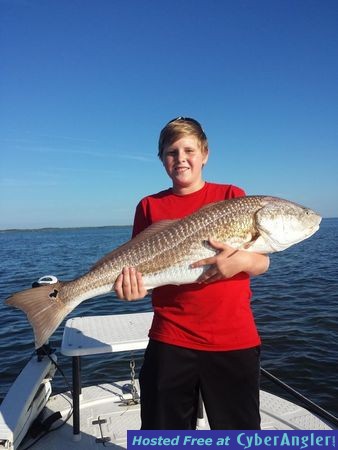 Capt. Joe Porcelli put Preston on his first redfish and it was big!