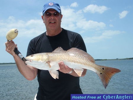 Bob Zucker with a max slot redfish Estero Bay