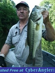 A Rainy, Summertime Day in Alabama Produces a Big Largemouth Bass on Logan