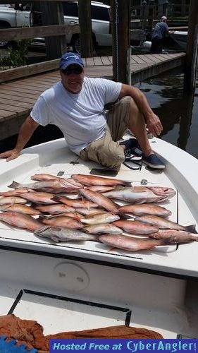 Capt. Darel Carter-John w/ fish