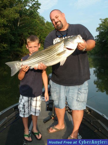 Father and Son With Big, Alabama Striped Bass!