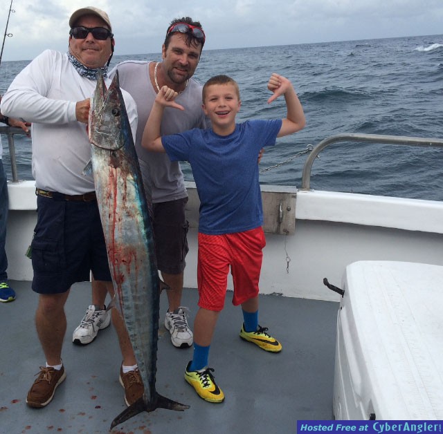 Nine-year-old Kaden MacNeil with 40 lb. Wahoo.