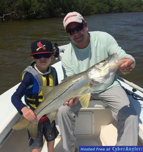 Youth angler with nice snook with Capt. Todd Geroy