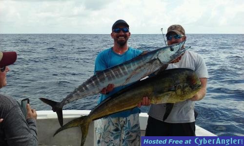 Adam and Mick with a nice wahoo and dolphin pair caught aboard the New Latt