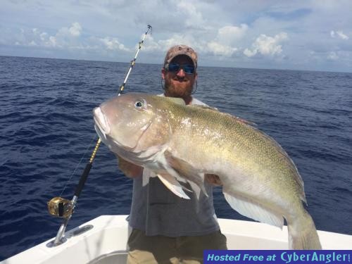 Capt Adam with a monster golden tilefish caught with New Lattitude Sportfis