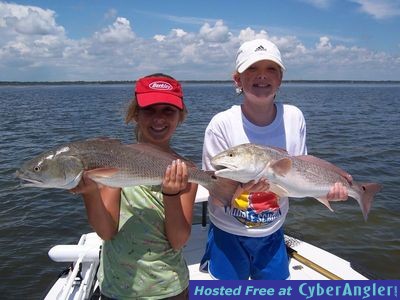 Jordan Story and Olivia George  both 11 doubled up on these two 27'' redfis