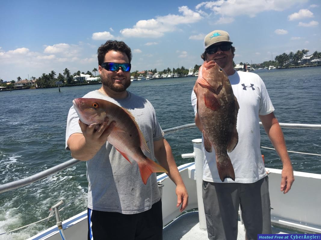 Clint and Jesse with a nice mutton snapper and red grouper caught on Catch