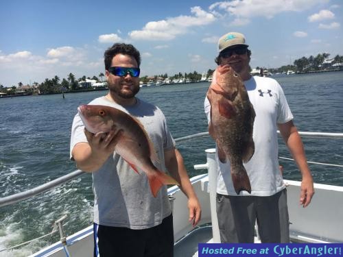 Clint and Jesse with a nice mutton snapper and red grouper caught on Catch